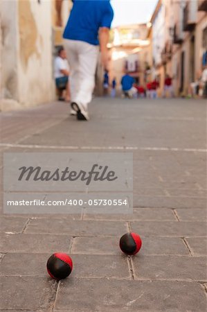 Traditional Spanish pelota match played on a cobblestone street