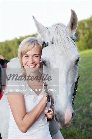 Young woman with horse