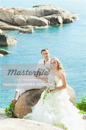 Bride and groom on the beach. Tropical wedding