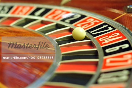 image with a casino roulette wheel with the ball on number 17