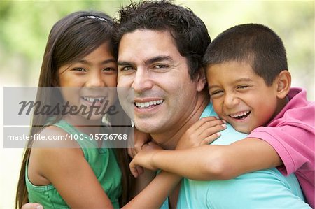Father With Children In Park
