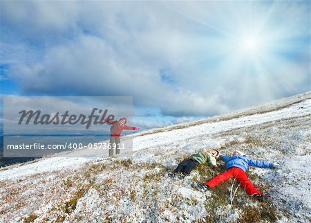 October Carpathian mountain Borghava plateau with first winter snow (and mother with children get fun)