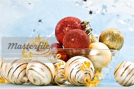 Holiday series: christmas red and golden ball in bowl