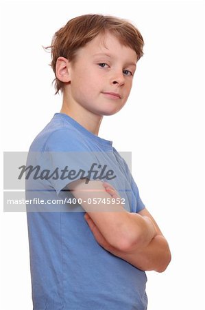 Portrait of a confident young boy with arms crossed