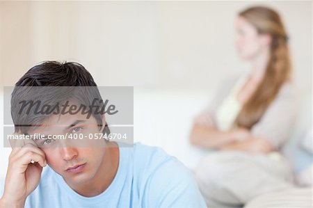 Couple after an argument in their living room