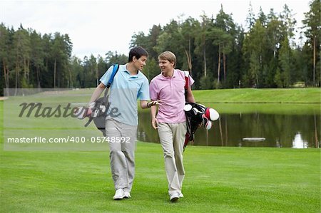 Two young men on the golf course