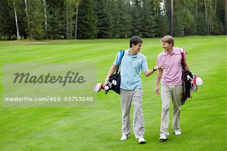 Men talking on the golf course