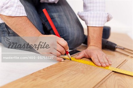 Home improvment - laying laminate flooring, measuring