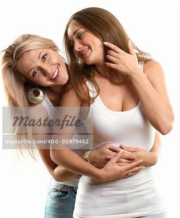 two european women looking on camera against white background