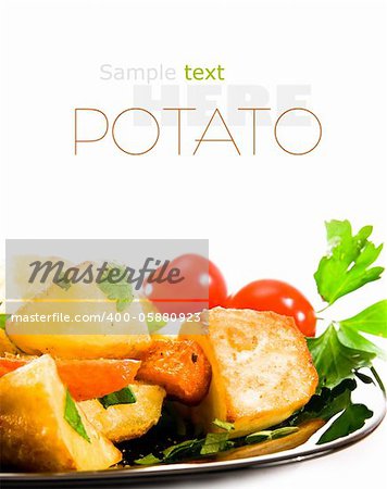 Roasted potatoes with herbs over white background