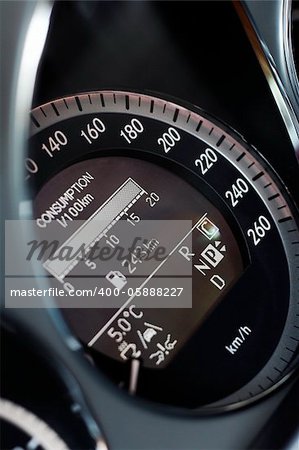 Fast car speedometer closeup detail