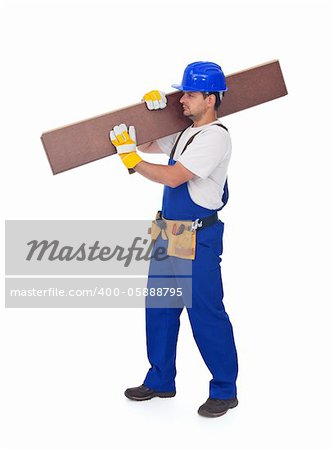 Handyman or worker carrying wooden laminate flooring - isolated with a bit of shadow