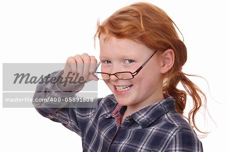 Portrait of a young girl wearing glasses on white background