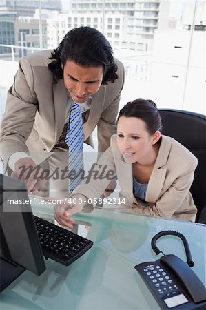 Portrait of a focused business team using a computer in an office