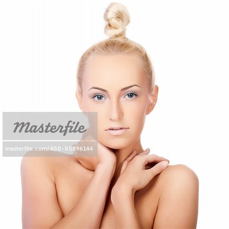 Closeup portrait of beautiful female model with blue eyes on white background