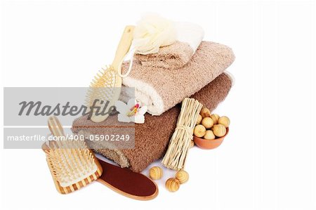 Towels and spa set isolated on white background.