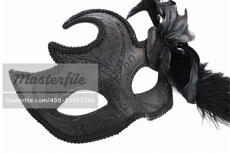 Black carnival mask isolated on white background.
