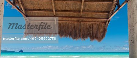 shelter made of natural materials on a tropical beach