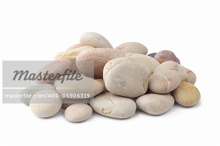 Sea pebble stones isolated on white background