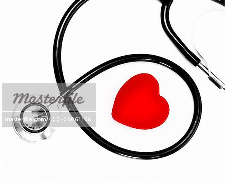 stethoscope and a red heart over a white background