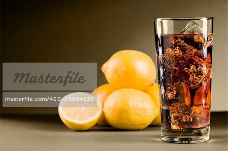 photo of delicious lemon ice team with ice cubes on sepia background