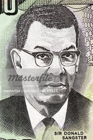 Donald Sangster (1911-1967) on 100 Dollars 2007 Banknote from Jamaica. Jamaican politician and the second Prime Minister of Jamaica.