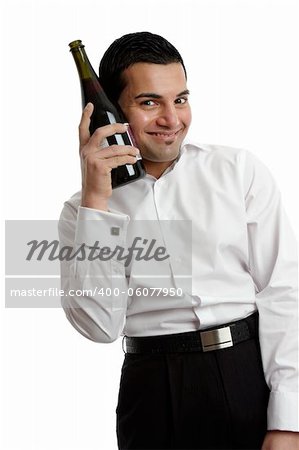 A happy man holding a wine bottle.  White background,