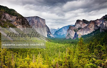 tunnel  viewpoint at yosemite national park with heavy overcast and bright green fir forest