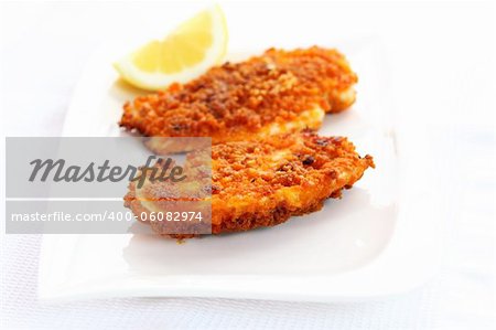 Fried chicken schnitzel with lemon