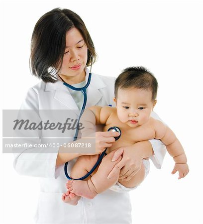 Children's doctor exams infant with stethoscope