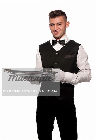 A young boy waiter with a tray. Isolated background and clipping path