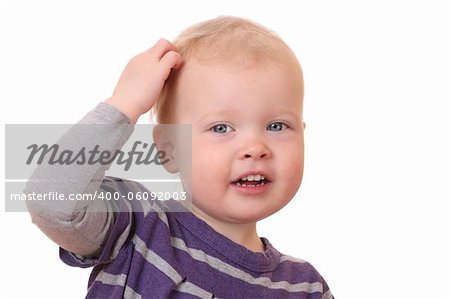 Portrait of a smiling toddler on white background
