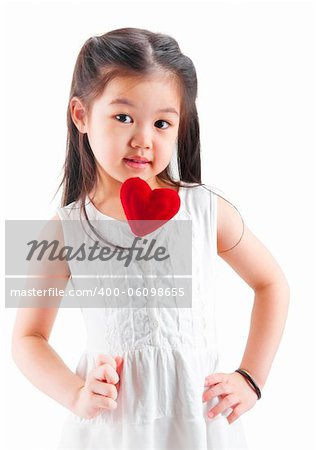 Asian little girl holding a love shape isolated on white background