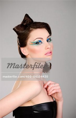 young beautiful woman with makeup portrait studio shot