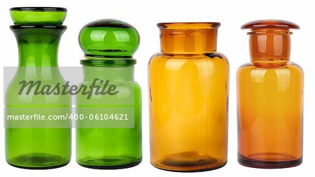 set of four empty glass jars isolated on white background