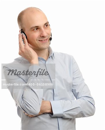 handsome customer service operator wearing a headset isolated on white background