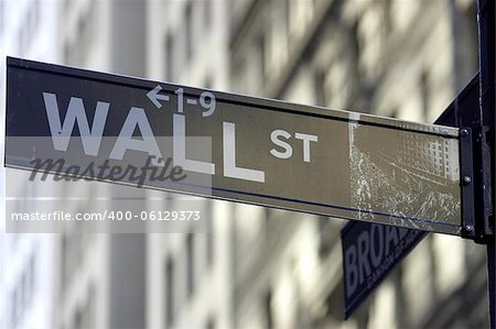 Wall street sign corner of broadway, the brown colour indicates the historic area, manhattan, new york city, America, usa
