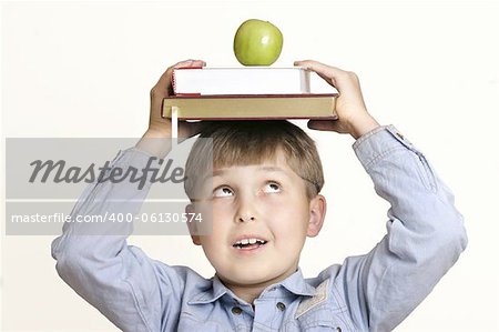 Schoolboy, textbooks, apple