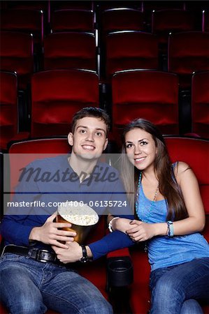 A couple in a movie theater