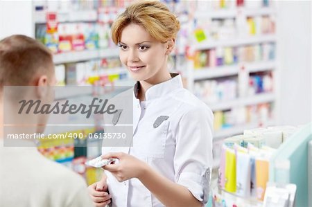 The pharmacist and the customer at the pharmacy
