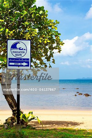 tsunami evacuation route sign on a beach, Thailand