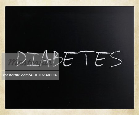 The word "Diabetes" handwritten with white chalk on a blackboard.