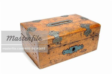 very old wooden moneybox over white background