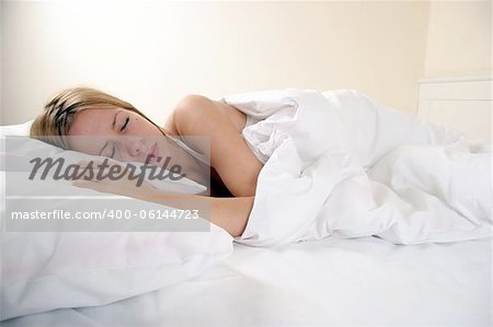 girl asleep in bed