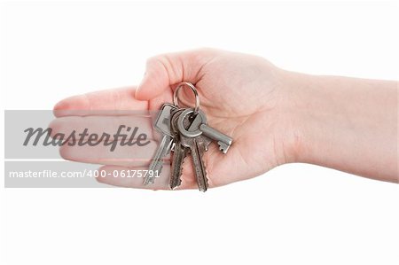 Hand and keys isolated on white background