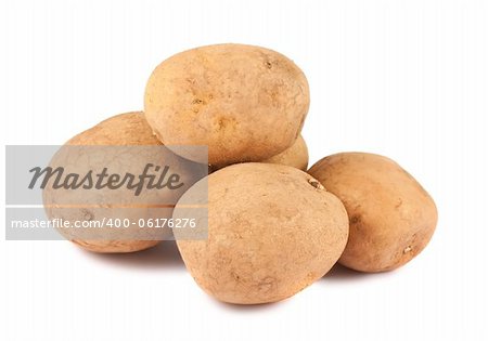 Heap of ripe potatoes isolated on white background
