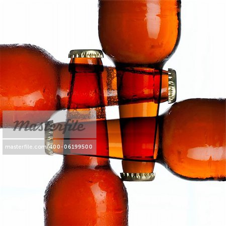 4 bottel beer background close up on white