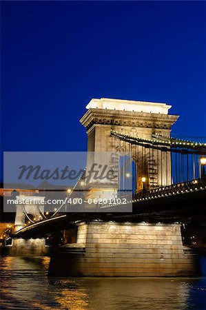 Night view of Chain bridge, Royal Palace and Danube river in Budapest