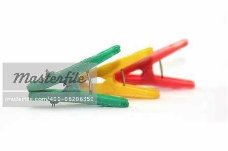 three clothespin with different colors