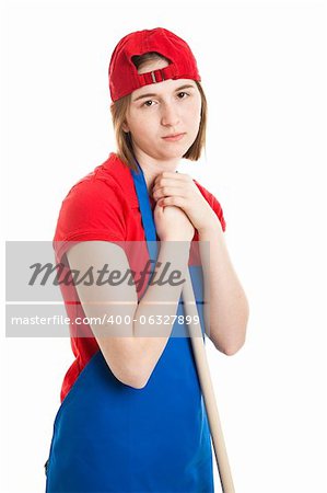 Sad teenage girl in her work uniform, leaning on her mop or broom.